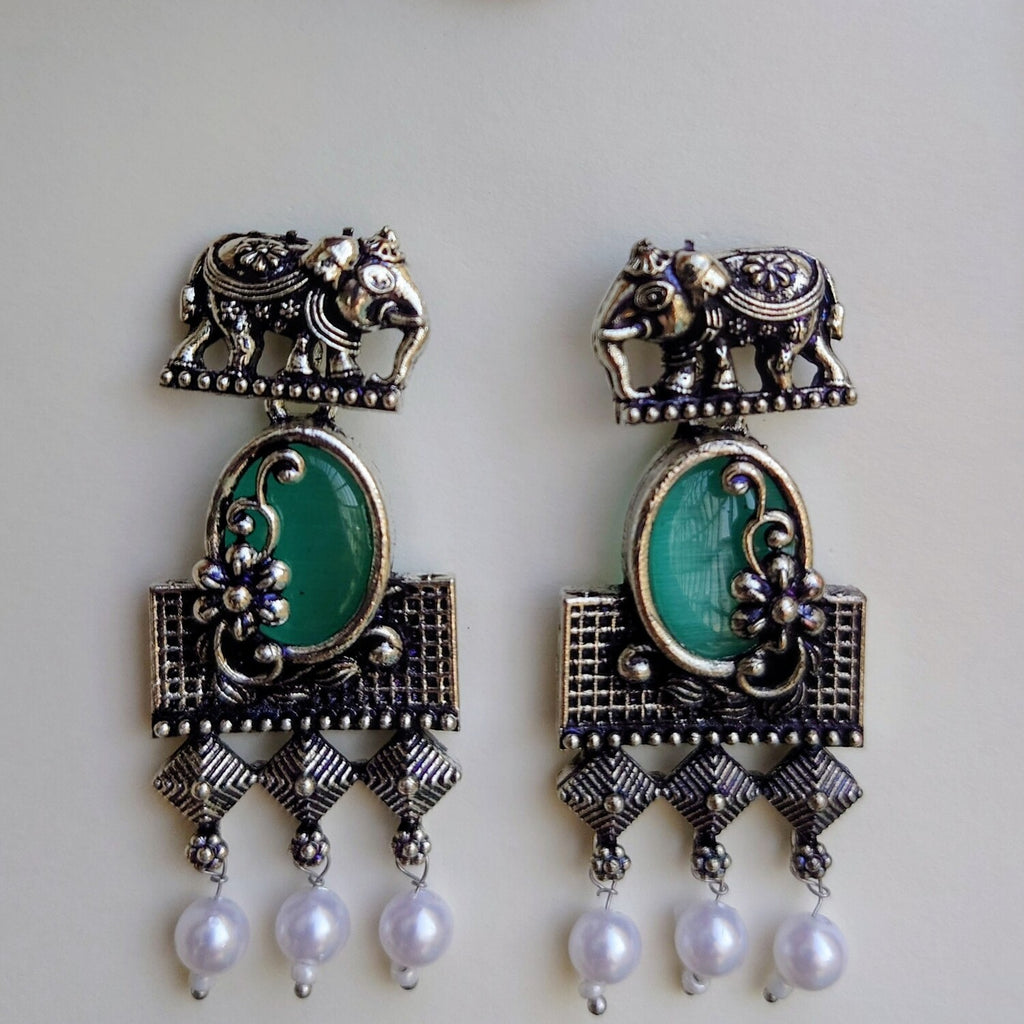 Green stone with elephant studearrings