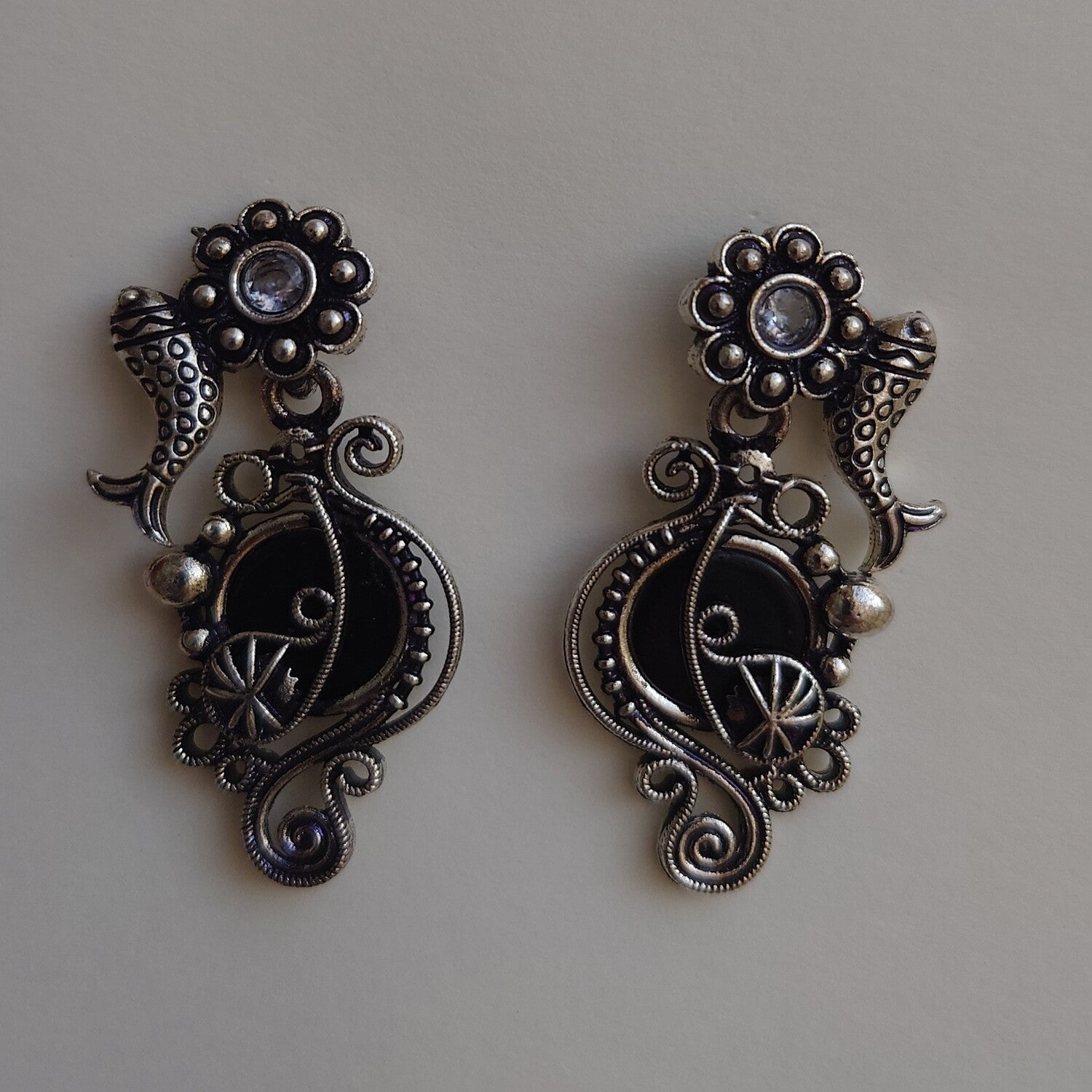 Black stone fish oxidised silver earrings