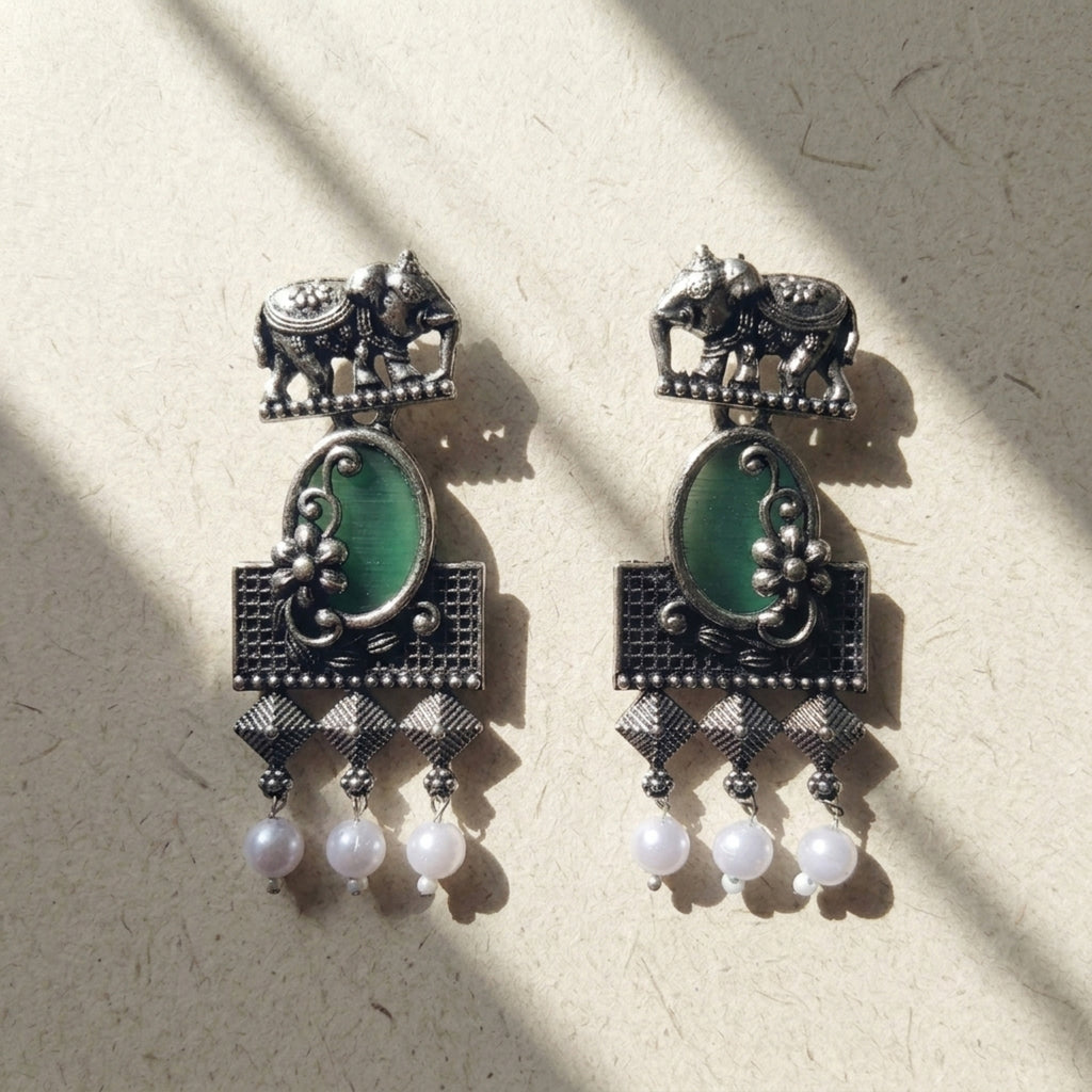 Green stone with elephant studearrings